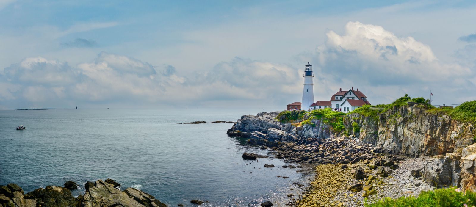 Portland Head Light on the rocky Maine coast under a clear sky